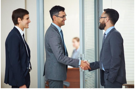 Business professionals engaging in compliance collaboration in India using digital platforms and regulatory frameworks for effective governance.